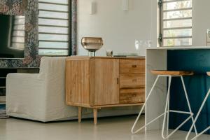 TV o dispositivi per l'intrattenimento presso Tamarin Sunset Beach II