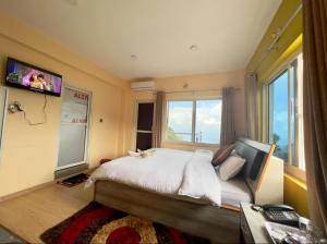 TV a/nebo společenská místnost v ubytování Hotel Village View Nagarkot