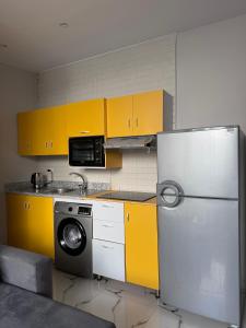 Kuchyň nebo kuchyňský kout v ubytování Sea Light Apartment