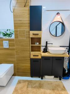 Et badeværelse på Апартамент BLUE CREAM