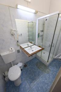 Koupelna v ubytování Hotel Transilvania