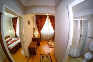 Koupelna v ubytování Hotel Transilvania