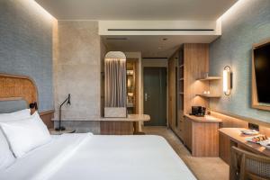 Postel nebo postele na pokoji v ubytování SENTIDO Apollo Palace