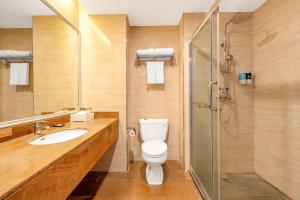 Koupelna v ubytování Zhangzhou Yuyuan Hotel
