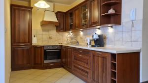 Kuchyňa alebo kuchynka v ubytovaní Apartament nad Potokiem