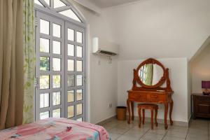 Voodi või voodid majutusasutuse Captain's Villa toas