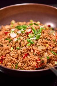 a pan filled with rice and vegetables at Hotel Astoria Playa Adults Only 4* Sup in Port d'Alcudia