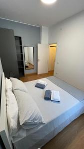 Postel nebo postele na pokoji v ubytování San Siro Guesthouse