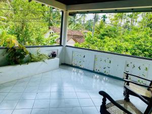 Un balcón o terraza de Berg House Unawatuna