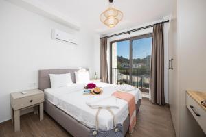 Ένα ή περισσότερα κρεβάτια σε δωμάτιο στο Villa Karya +36 φωτογραφίες