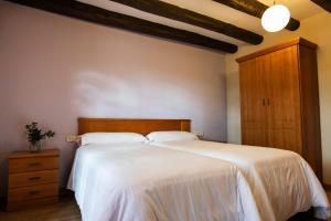 Cama o camas de una habitación en Camping & Bungalows Ligüerre de Cinca