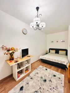 Postel nebo postele na pokoji v ubytování GREEN Apartment