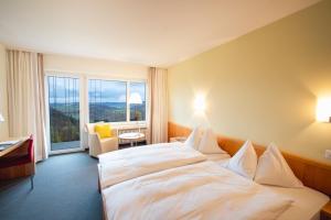 Letto o letti in una camera di Hotel Bad Ramsach