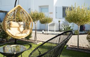 A garden outside SN Santorini Apartments