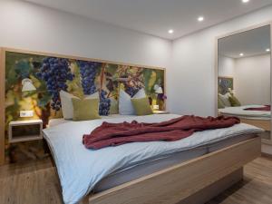 En eller flere senge i et værelse på Obst- und Ferienhof Gomeringer