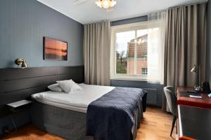 Voodi või voodid majutusasutuse Best Western Centralhotellet toas
