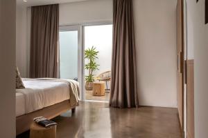 Andronis Arcadia Hotel客房内的一张或多张床位