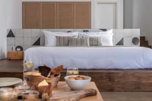 Andronis Arcadia Hotel客房内的一张或多张床位