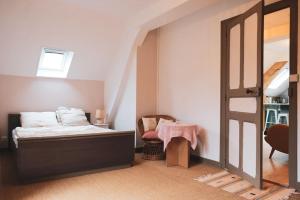 Postel nebo postele na pokoji v ubytování Charming House with exceptional Loire view