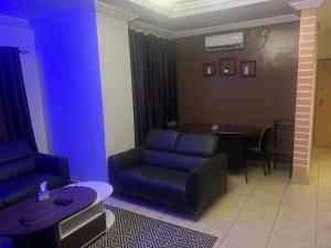 Ein Sitzbereich in der Unterkunft Appartement Familial Confortable
