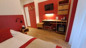 Cama ou camas em um quarto em Hotel International & Terminus