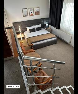 Postel nebo postele na pokoji v ubytování Grand Denizli Hotel