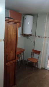 TV a/nebo společenská místnost v ubytování Apartamento Gloria Patricia