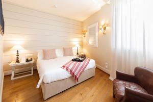 Resort Collina d'Oro - Hotel, Residence & Spa客房内的一张或多张床位