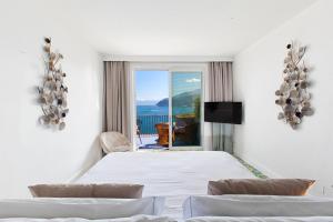 Postel nebo postele na pokoji v ubytování Hotel Belair + 37 fotografií