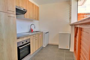 Köök või kööginurk majutusasutuses Villa Bon manjé cosy, piscine privative & vue Mer