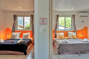 Voodi või voodid majutusasutuse Villa Bon manjé cosy, piscine privative & vue Mer toas +13 fotot