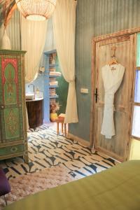 Postel nebo postele na pokoji v ubytování Riad 10 Mandarin BOUTIQUE RIAD