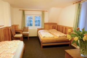 Postel nebo postele na pokoji v ubytování Hotel Sirákov