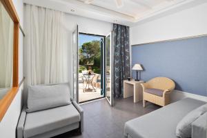 Postel nebo postele na pokoji v ubytování SENTIDO Apollo Palace + 37 fotografií