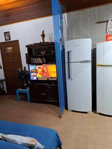 Cucina o angolo cottura di Casa Ilhabela entre a Praia Grande & Julião Altre 25 foto
