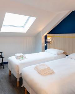 Postel nebo postele na pokoji v ubytování ibis Styles Morlaix