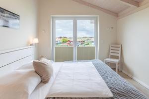 Postel nebo postele na pokoji v ubytování Wattenmeer