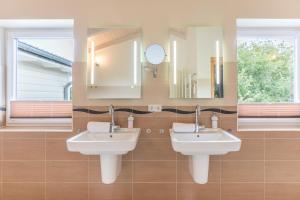 Koupelna v ubytování Wattenmeer + 21 fotografií