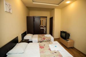 Postel nebo postele na pokoji v ubytování Hotel 4You