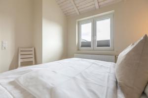 Postel nebo postele na pokoji v ubytování Seerose