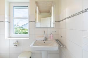 Koupelna v ubytování Seerose + 15 fotografií