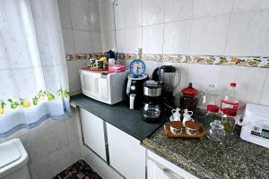 Η κουζίνα ή μικρή κουζίνα στο Casa dos Coelhos, 750m do centro, até 12 pessoas +78 φωτογραφίες