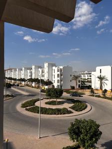 a curvy street with buildings in the background at قرية بالميرا للعائلات فقط in Ain Sokhna