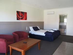 Posteľ alebo postele v izbe v ubytovaní Pittsworth Motor Inn
