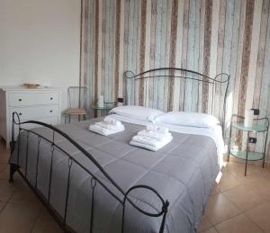 Posteľ alebo postele v izbe v ubytovaní Casa Casoni - Il Conero