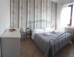 Posteľ alebo postele v izbe v ubytovaní Casa Casoni - Il Conero