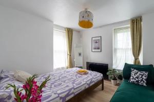 Ένα ή περισσότερα κρεβάτια σε δωμάτιο στο Quaint Apartment Near Tower-London Bridge and Big Ben +23 φωτογραφίες