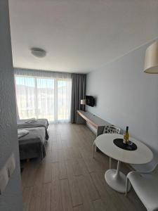 Ένα ή περισσότερα κρεβάτια σε δωμάτιο στο Apartament MERCURY