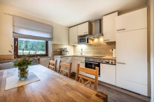Kuchyň nebo kuchyňský kout v ubytování Ferienhaus Waldwinkl