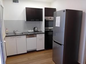 Cucina o angolo cottura di Liget Üdülőpark Fonyód